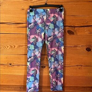 Vibrant Women's Leggings with Seahorse and Starfish Print